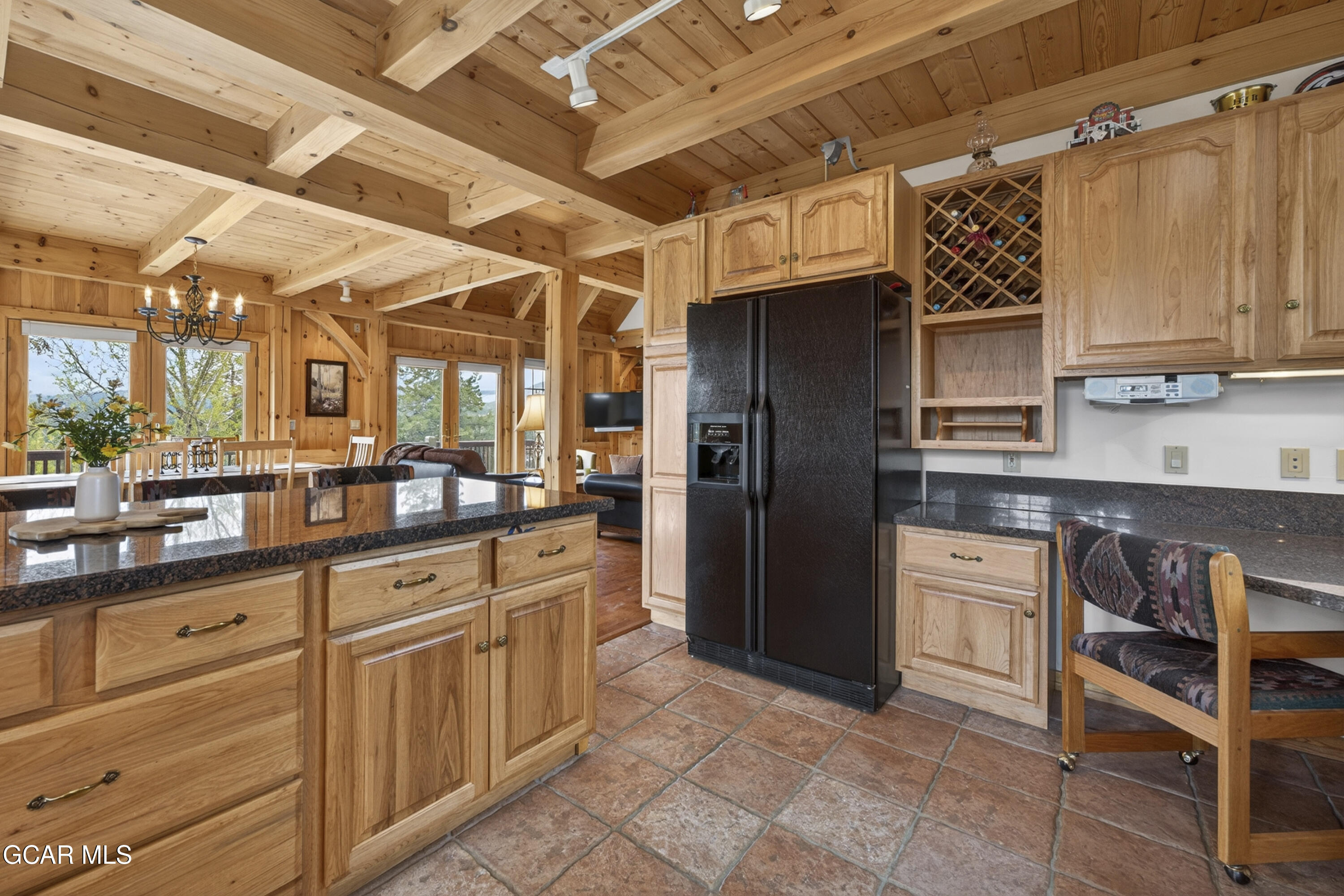 400 Ridge Road Tabernash, CO 80478 - Photo 26 of 50 a kitchen with stainless steel appliances granite countertop a refrigerator and cabinets