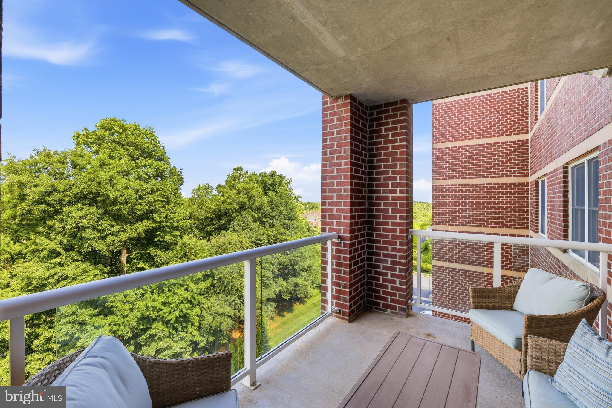 12240 Roundwood Road, Unit 605 Lutherville-Timonium, MD 21093 - Photo 9 of 38 Bright and airy balcony for your enjoyment