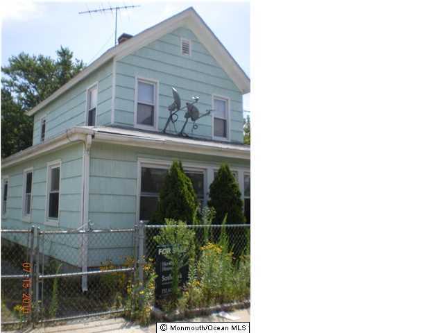 1 Fulton Street Keyport, NJ 07735 - Photo 1 of 3 a front view of a house