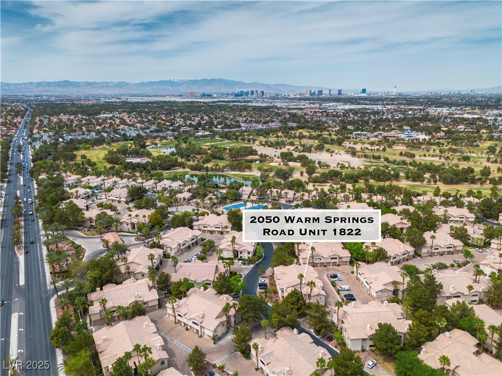 2050 West Warm Springs Road, Unit 1822 Henderson, NV 89014 - Photo 44 of 55 Drone / aerial view with a mountain view and a residential view
