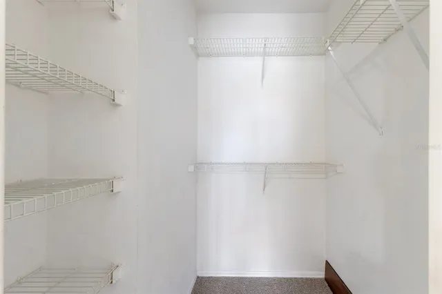 a view of small space with racks on the wall