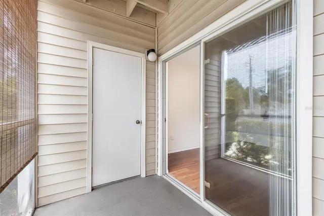 a view of a bathroom with a glass door
