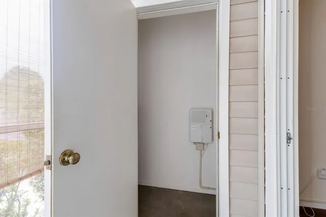 a bathroom with a glass shower door