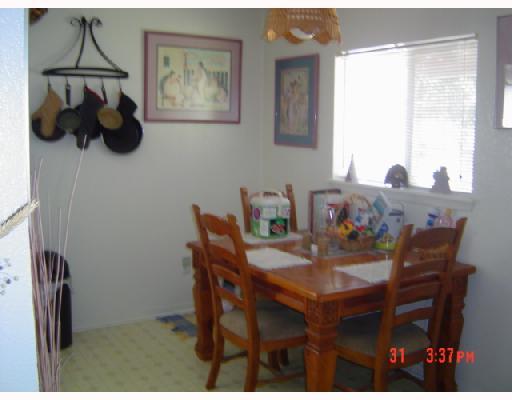 2821 Ransom Island Drive Corpus Christi, TX 78418 - Photo 6 of 6 a dining room with furniture and window