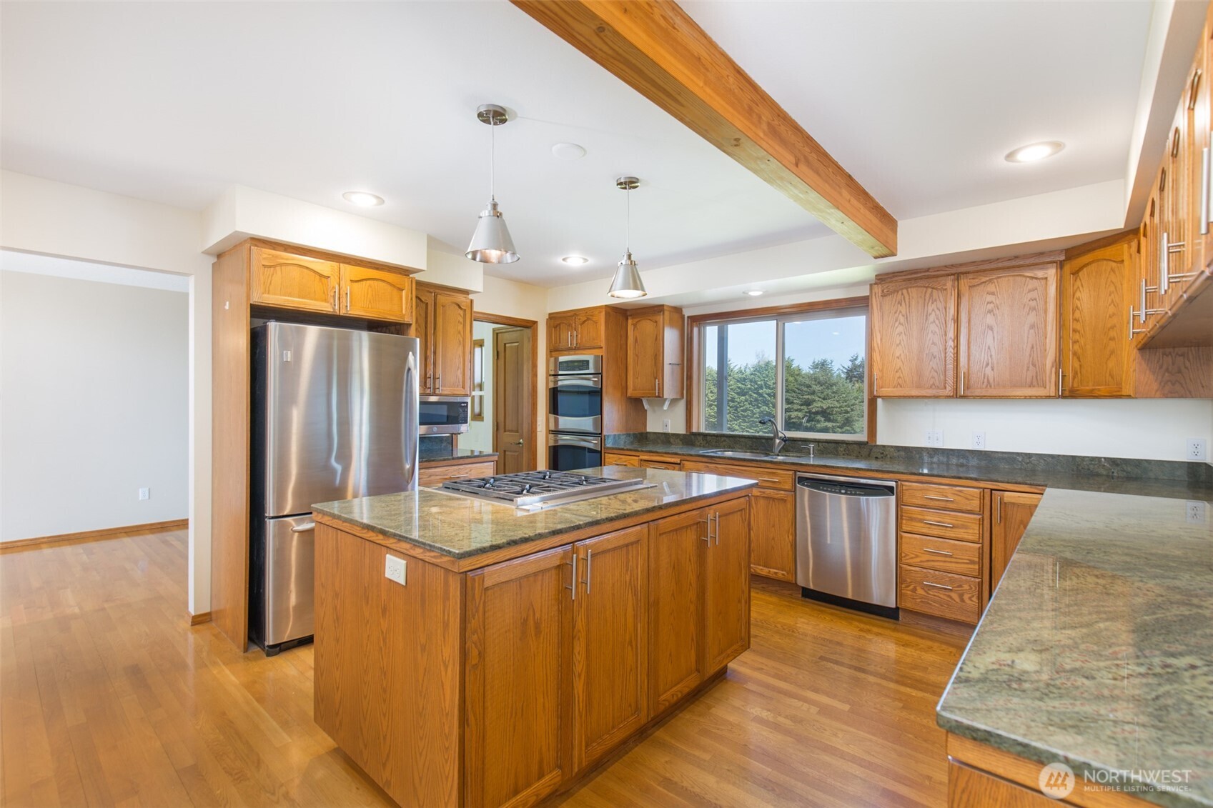 81 Bon Jon View Way Sequim, WA 98382 - Photo 19 of 38 a kitchen with stainless steel appliances granite countertop a sink and a stove