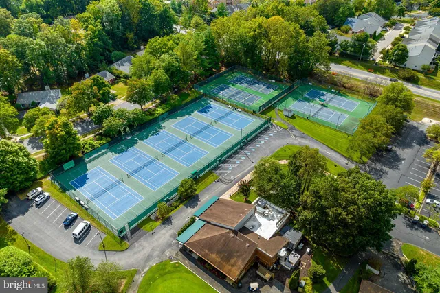 an aerial view of a house with a garden