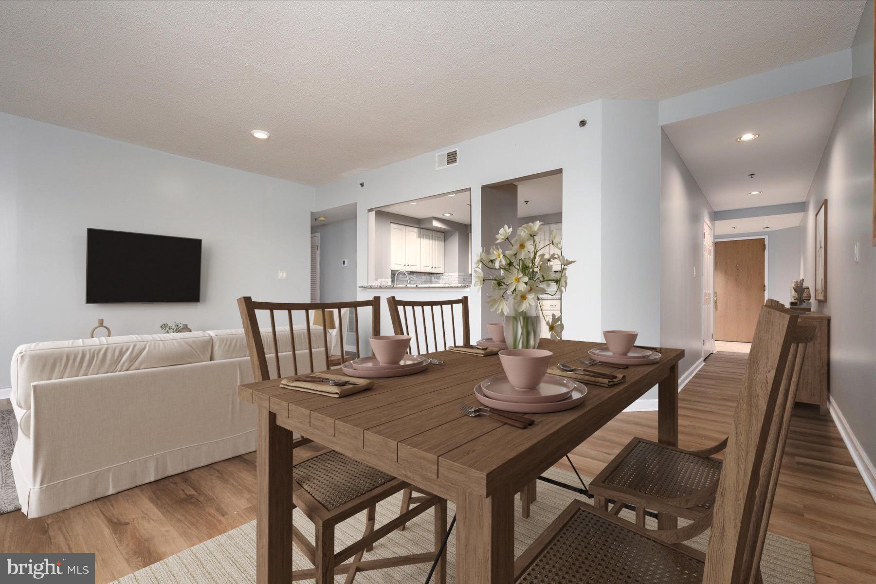 930 Astern Way, Unit 405 Annapolis, MD 21401 - Photo 4 of 27 a view of a dining room with furniture window and wooden floor