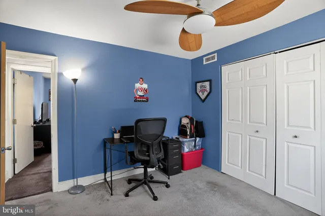 a view of a hallway with entryway