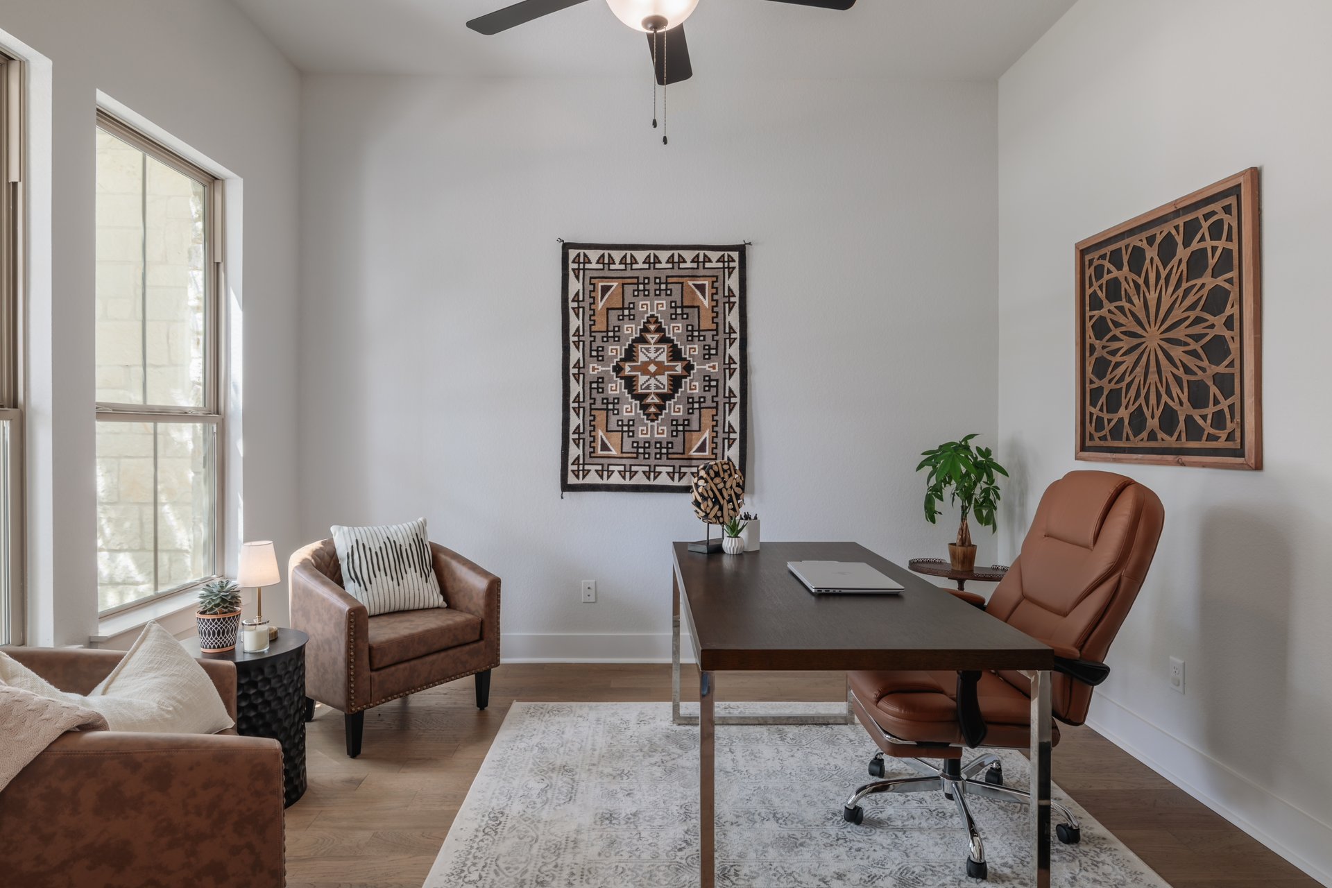 317 Autumn Oak Way Georgetown, TX 78628 - Photo 8 of 40 a view of a workspace with furniture and a window