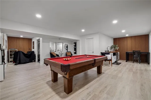 a bedroom with furniture and a table