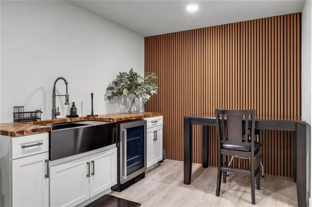 a kitchen with stainless steel appliances and cabinets