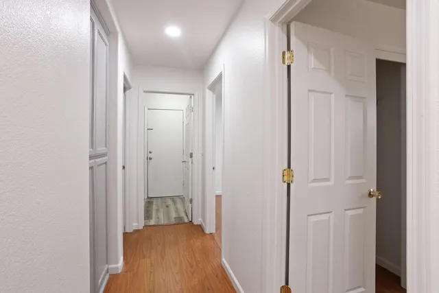 a bathroom with a sink vanity mirror and shower