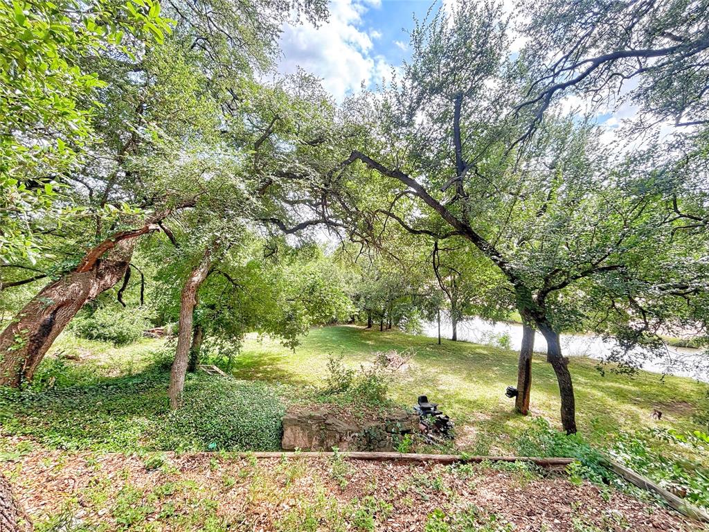 101 Riverview Road Millsap, TX 76066 - Photo 19 of 26 a view of a garden with an outdoor space