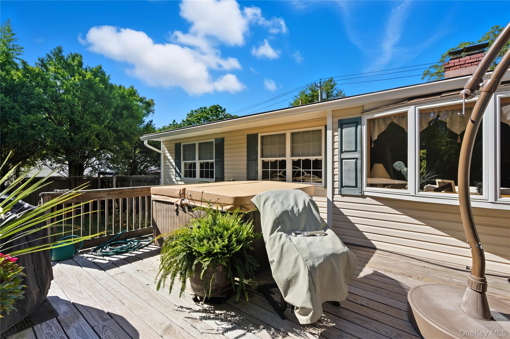 347 Wading River Road Manorville, NY 11949 - Photo 23 of 30 Deck with area for grilling