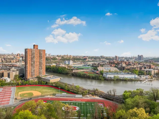 a view of a city with tall buildings
