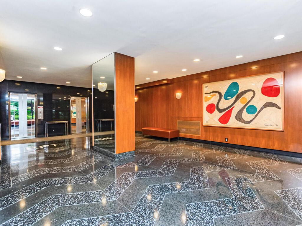 555 Kappock Street, Unit 18C Bronx, NY 10463 - Photo 16 of 19 a view of an empty room with glass door