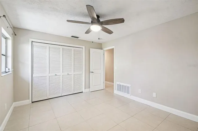 a view of a livingroom with furniture and a fireplace