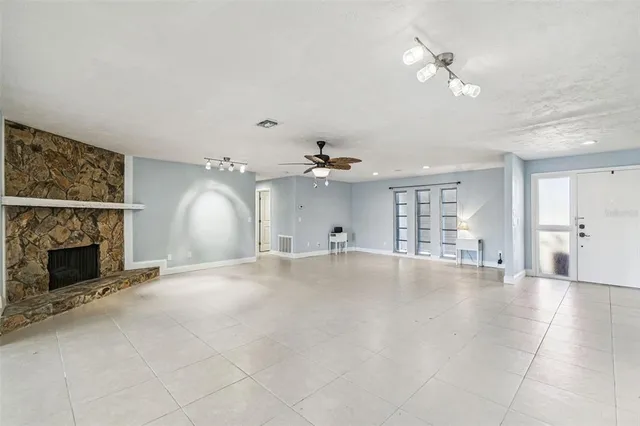 a view of a living room and chandelier