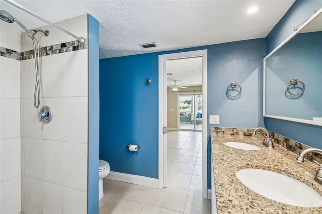 a view of a backyard with sitting area