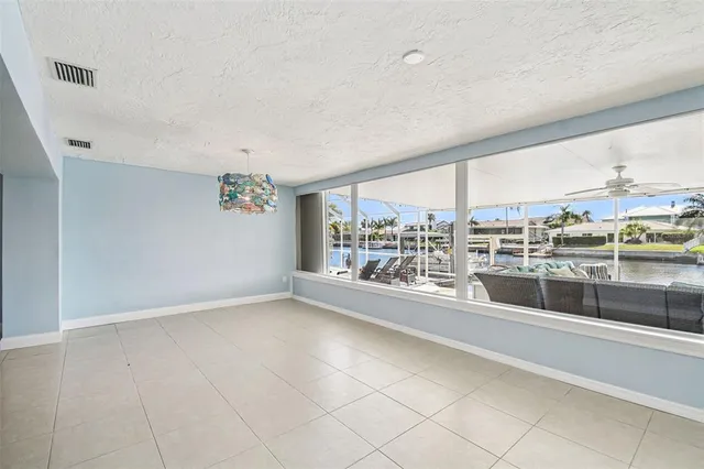 an aerial view of a houses with outdoor space