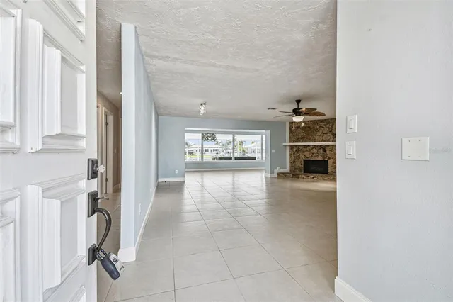 a bathroom with a granite countertop sink a toilet and a mirror