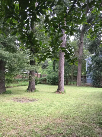 a fire hydrant in the middle of a field