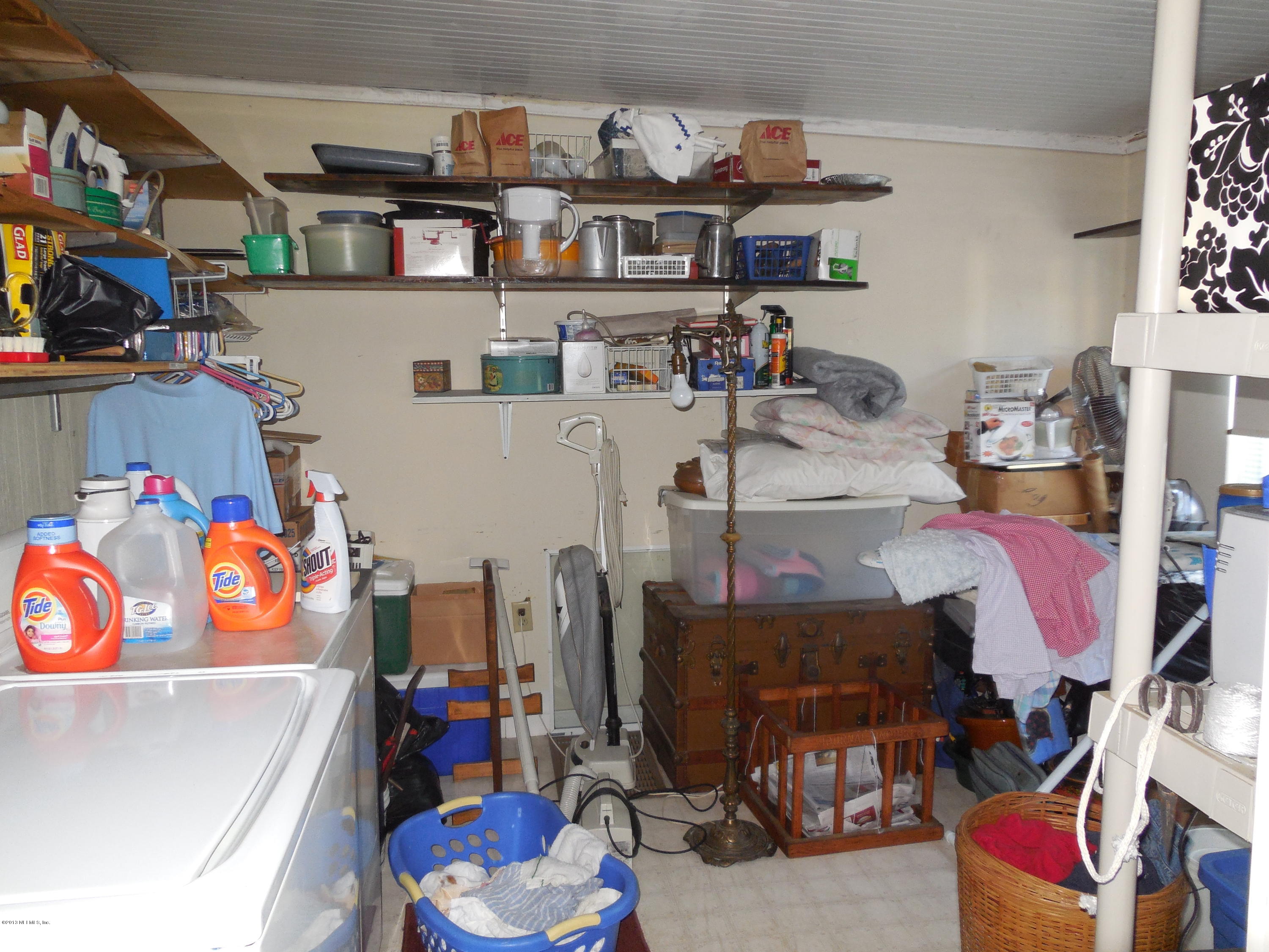 105 Ketner Road Welaka, FL 32112 - Photo 17 of 34 a room with storage and utility