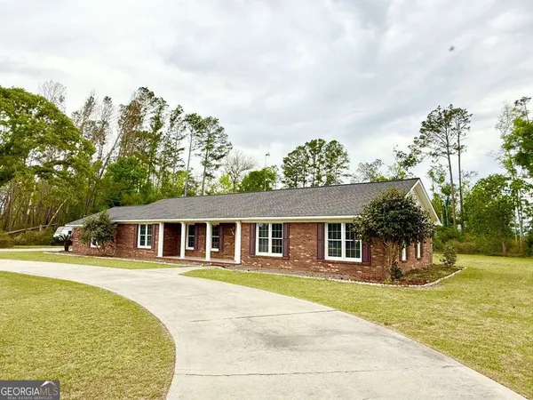 a view of a house with a swimming pool