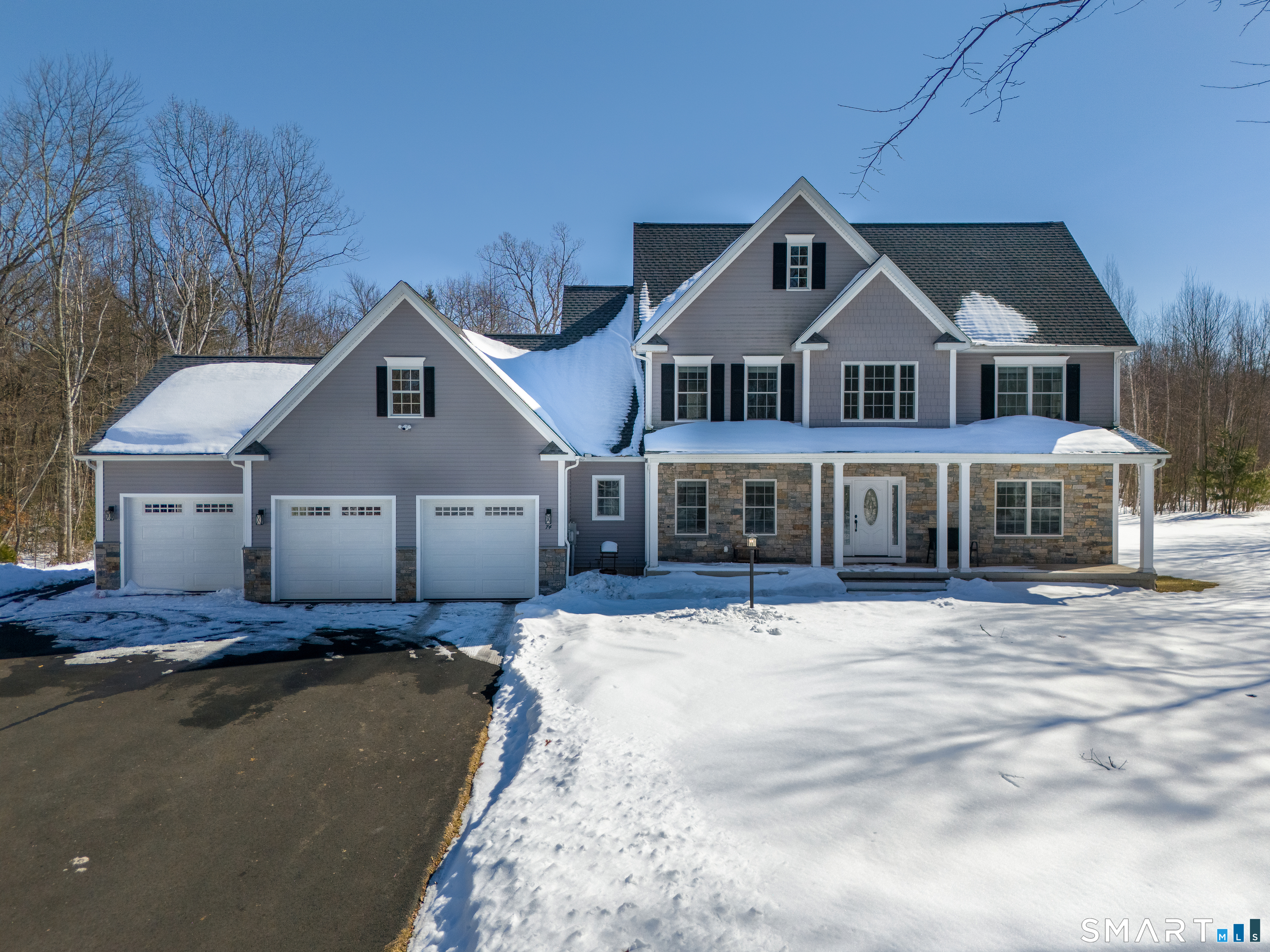 74 Wappingwood Road Ellington, CT 06029 - Photo 1 of 1 a front view of a house with a yard