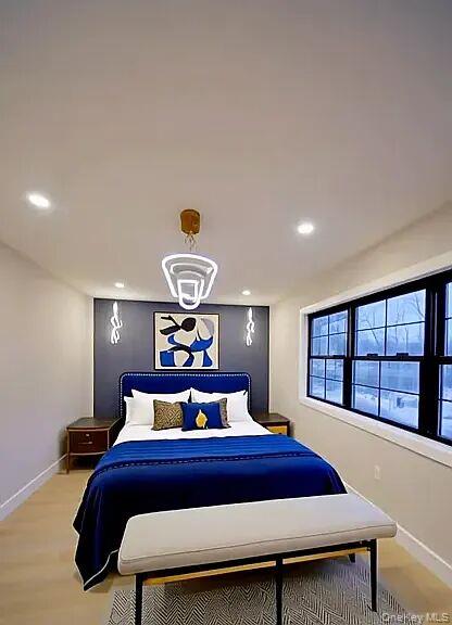 249-17 147th Road, Unit 1 Queens, NY 11422 - Photo 9 of 13 Virtually staged master bedroom