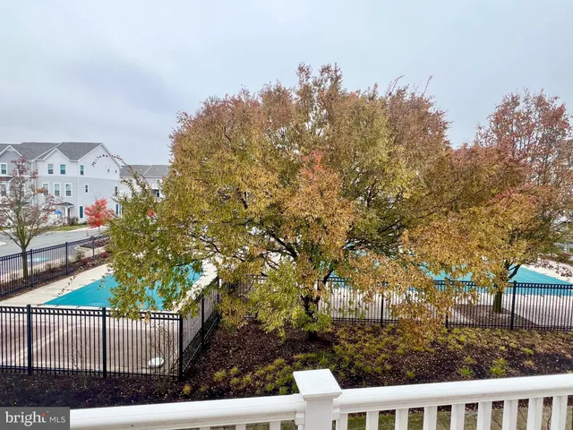 a view of a yard in front of a house