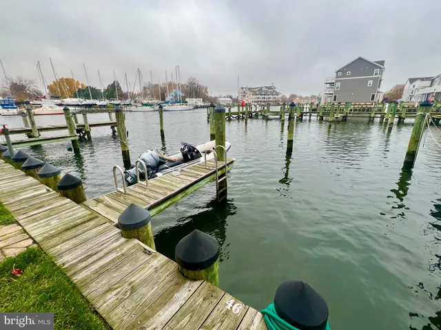 a view of a lake with sitting area