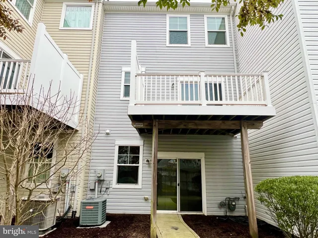 a front view of a house with a balcony