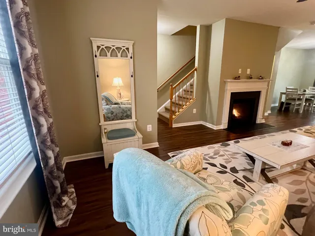 a living room with a fireplace