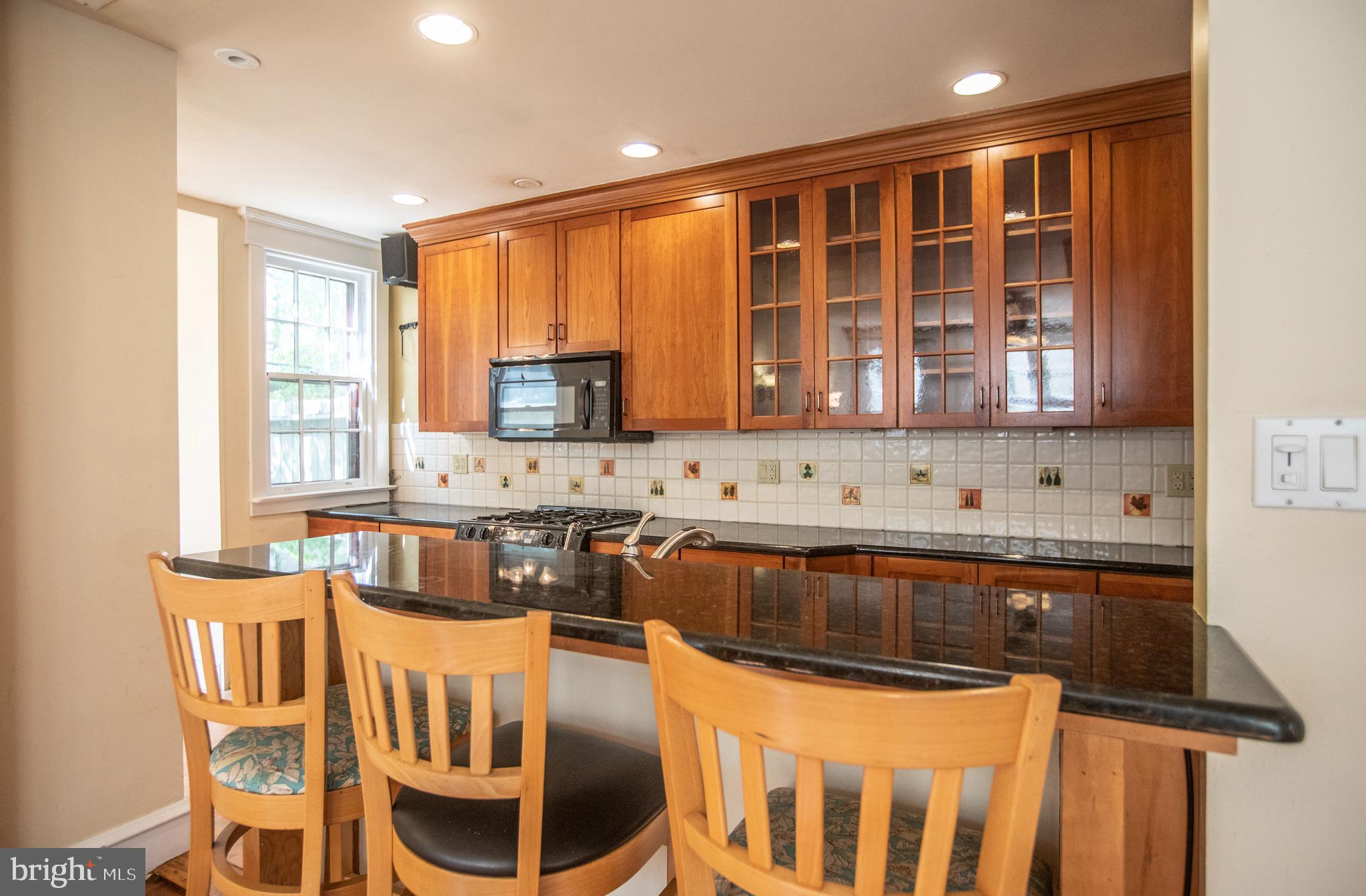 311 Wellesley Road Philadelphia, PA 19119 - Photo 13 of 32 Kitchen with breakfast bar