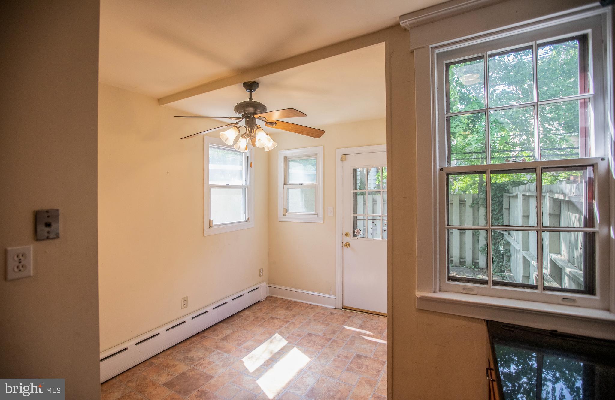 311 Wellesley Road Philadelphia, PA 19119 - Photo 15 of 32 Eat-in area in kitchen with door to rear deck