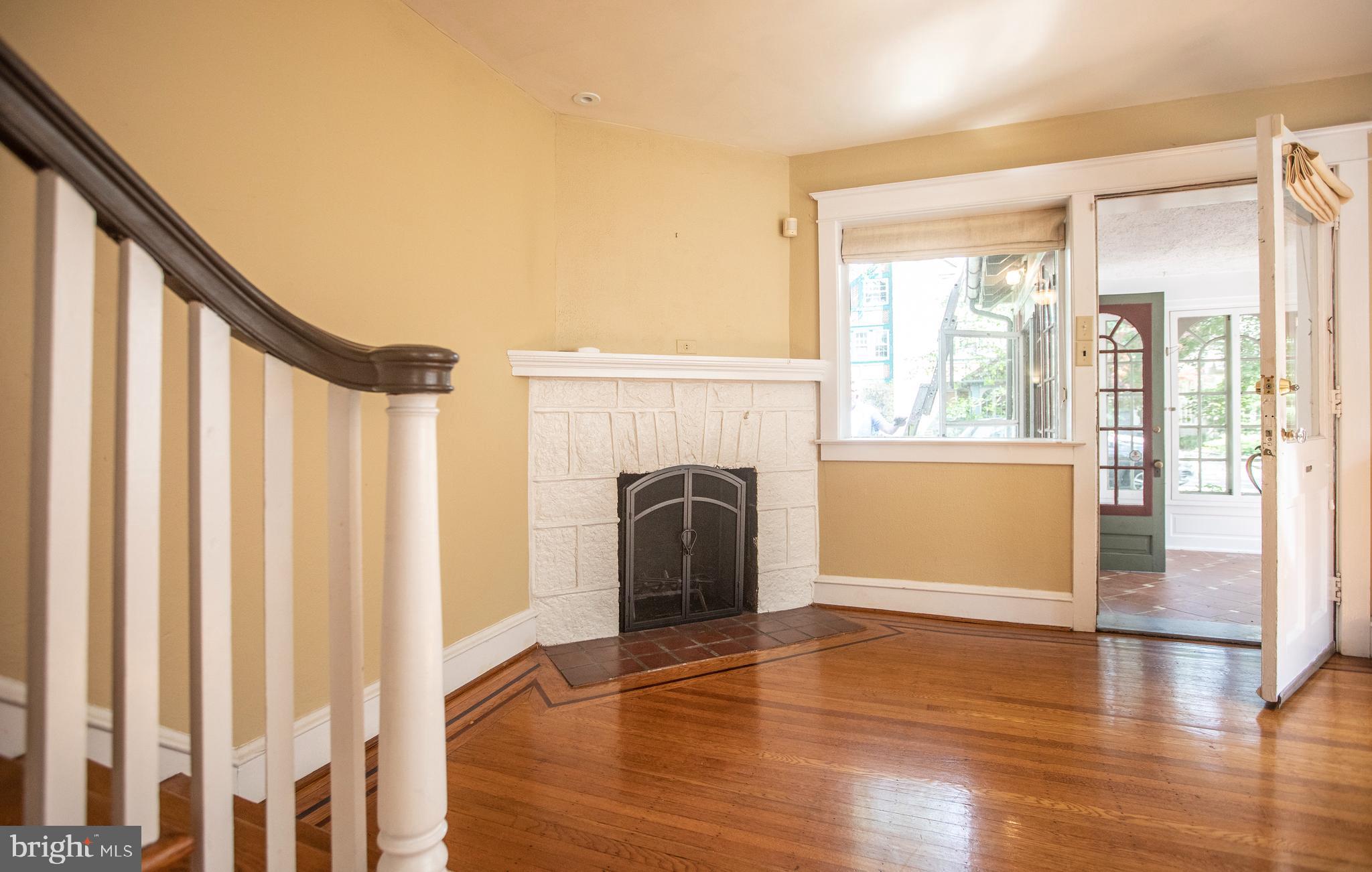 311 Wellesley Road Philadelphia, PA 19119 - Photo 8 of 32 Living room fireplace