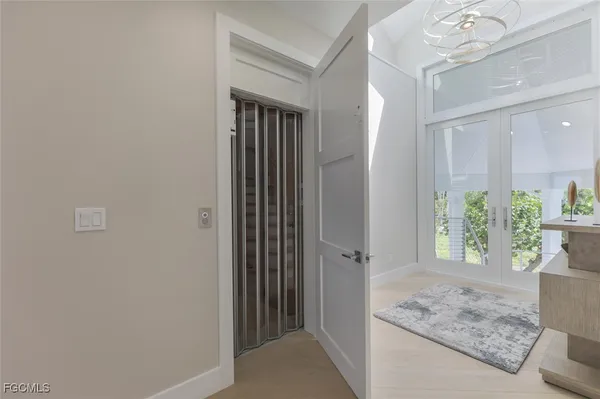 a view of livingroom with furniture and floor to ceiling window