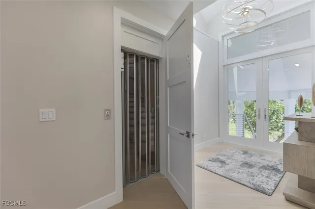 a view of livingroom with furniture and floor to ceiling window
