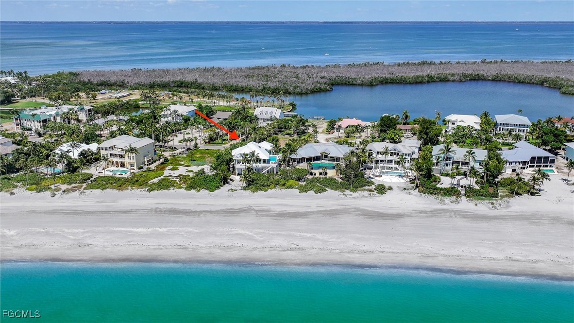 941 South Seas Plantation Road Captiva, FL 33924 - Photo 50 of 50 an aerial view of a houses with a lake view