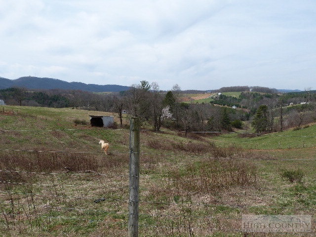 Moxley Ridge Road Sparta, NC 28675 - Photo 15 of 16 a view of a town with mountains in the background