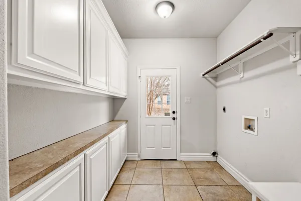 a view of a hallway with closet area