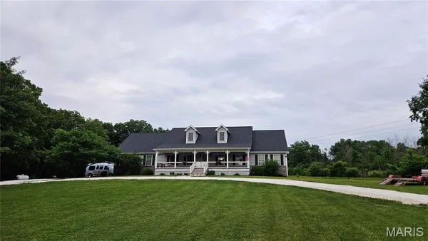 $550,000 | 406 Ravenwood Drive, Troy, MO 63379