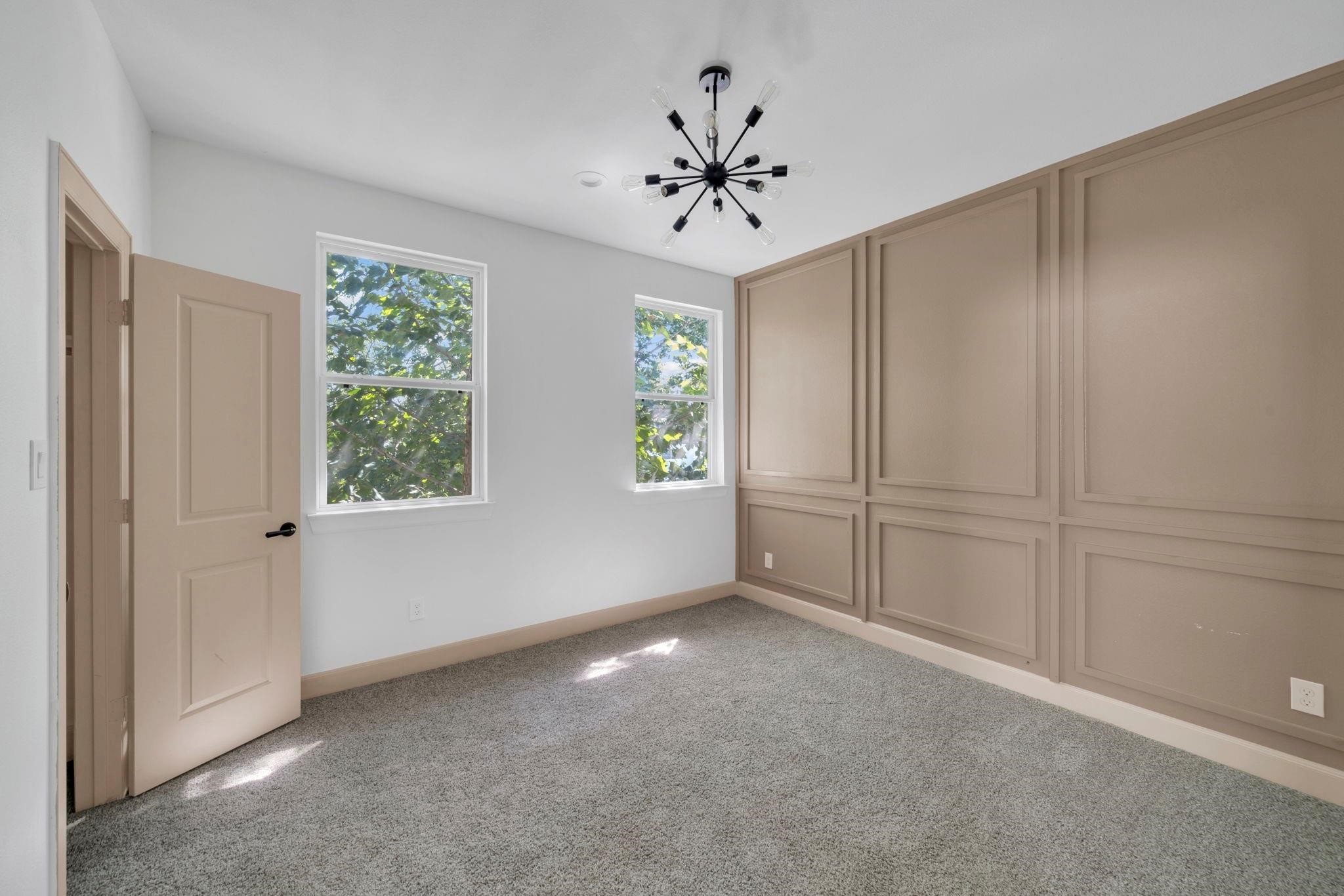 9551 Neuens Road, Unit B Houston, TX 77080 - Photo 21 of 32 a view of an empty room with a window