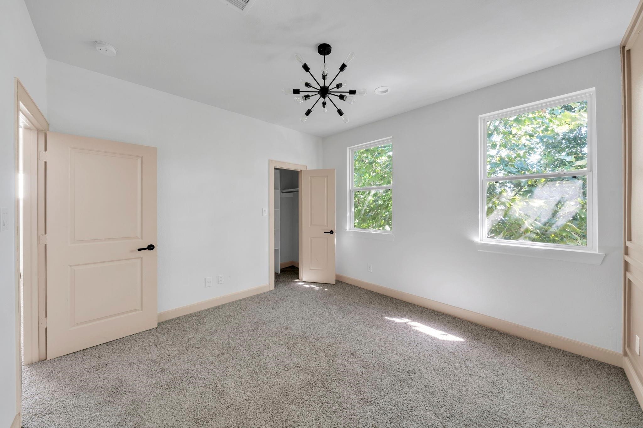 9551 Neuens Road, Unit B Houston, TX 77080 - Photo 22 of 32 a view of an empty room with a window