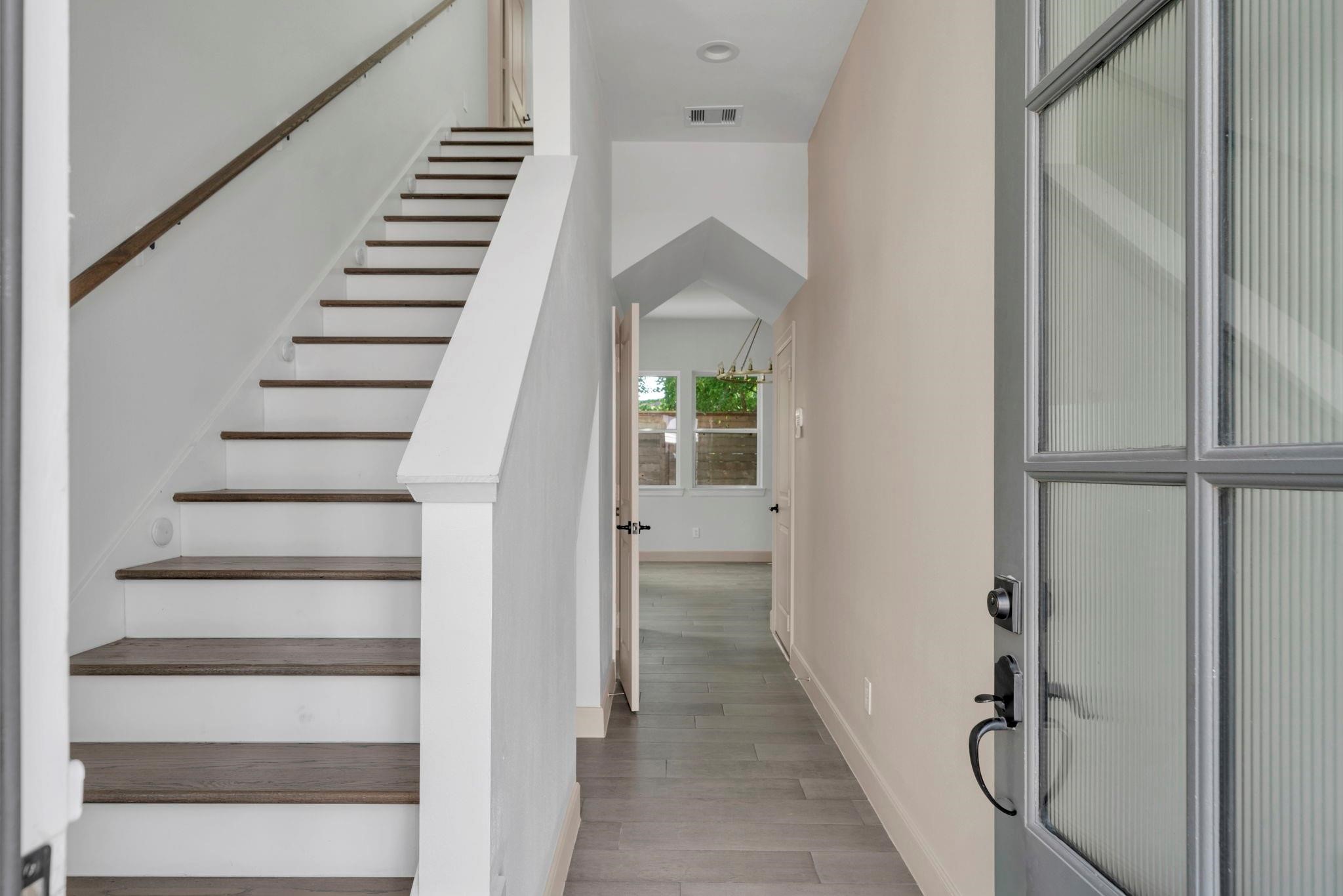 9551 Neuens Road, Unit B Houston, TX 77080 - Photo 32 of 32 a view of hallway with stairs and wooden floor