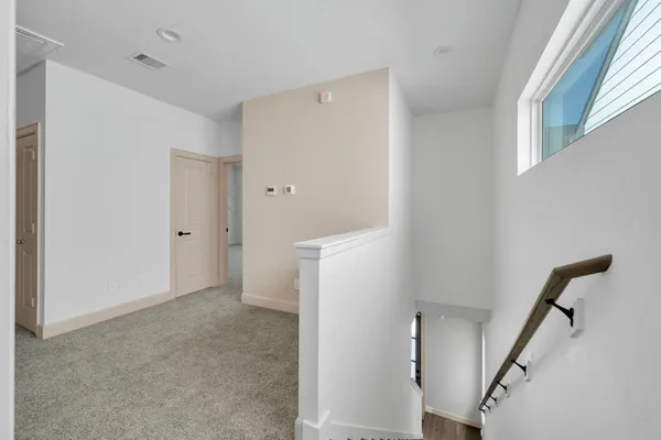 a view of a hallway with entryway