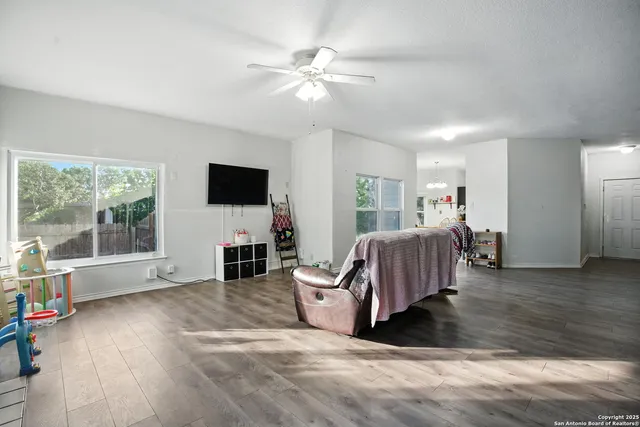 a kitchen with stainless steel appliances a refrigerator sink and cabinets
