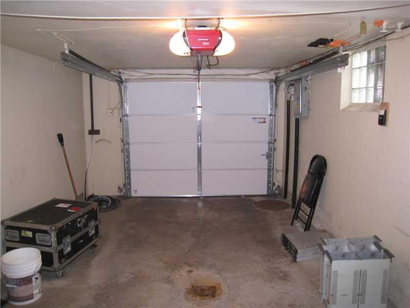 1507 Homestead Road Penn Hills, PA 15147 - Photo 14 of 17 Parking Lot/Garage. The integral 1-car garage features a newer garage door with automatic opener.