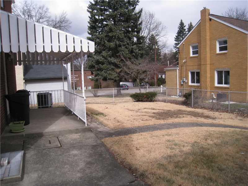 1507 Homestead Road Penn Hills, PA 15147 - Photo 16 of 17 Exterior Back. Access this covered patio from the kitchen. It s a great spot for grilling! The low maintenance back yard is fully fenced.
